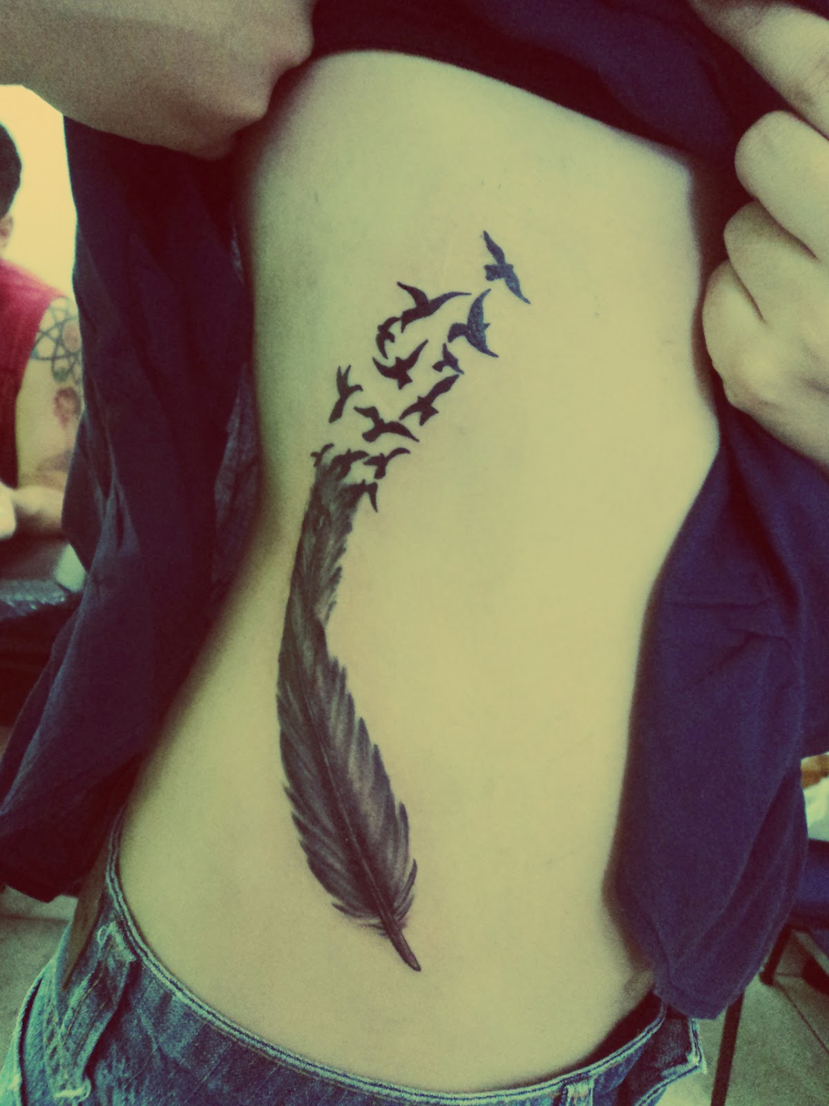 Bird feather tattoos for girl and women