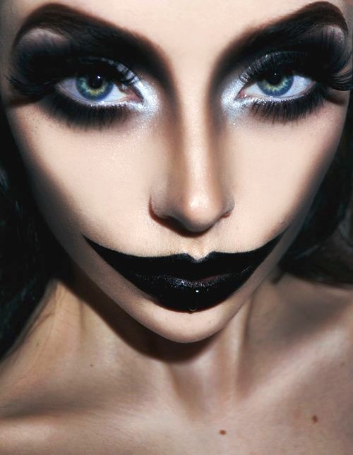 Evil black lip and eye makeup of joker for Halloween