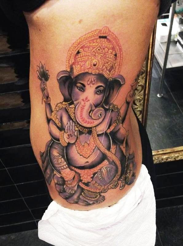Female Sitting Elephant Tattoo