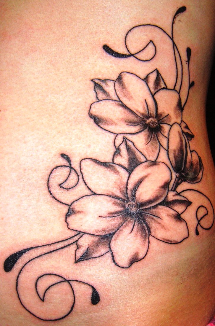 Flower-and-Swirls-Tattoos-on-Ribs-for-Women