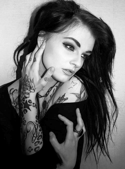 Girl with Black Hair and Tattoos