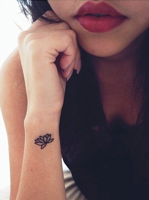 Small Lotus Flower Wrist Tattoo