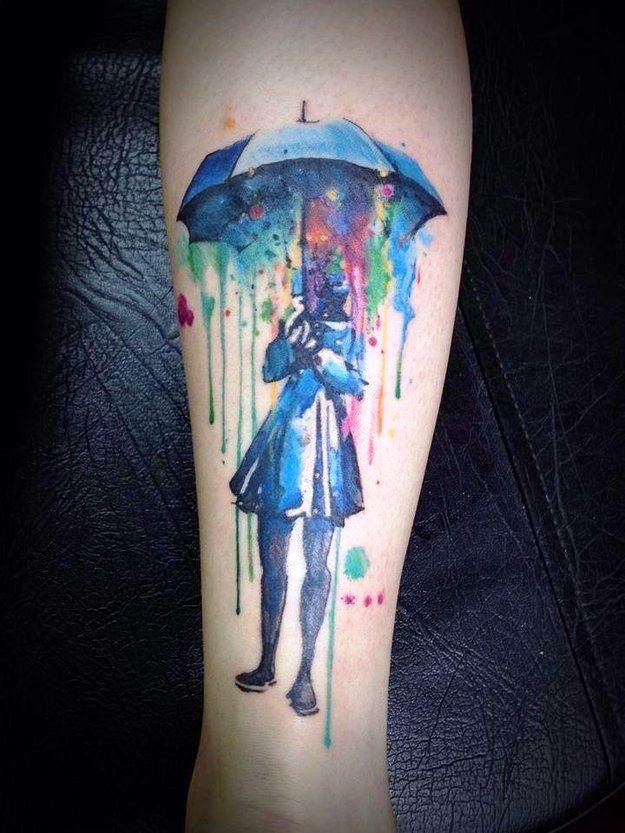 Women's and umbrella watercolor tattoo