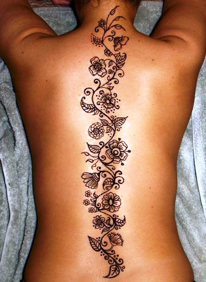 spine tattoo flowers