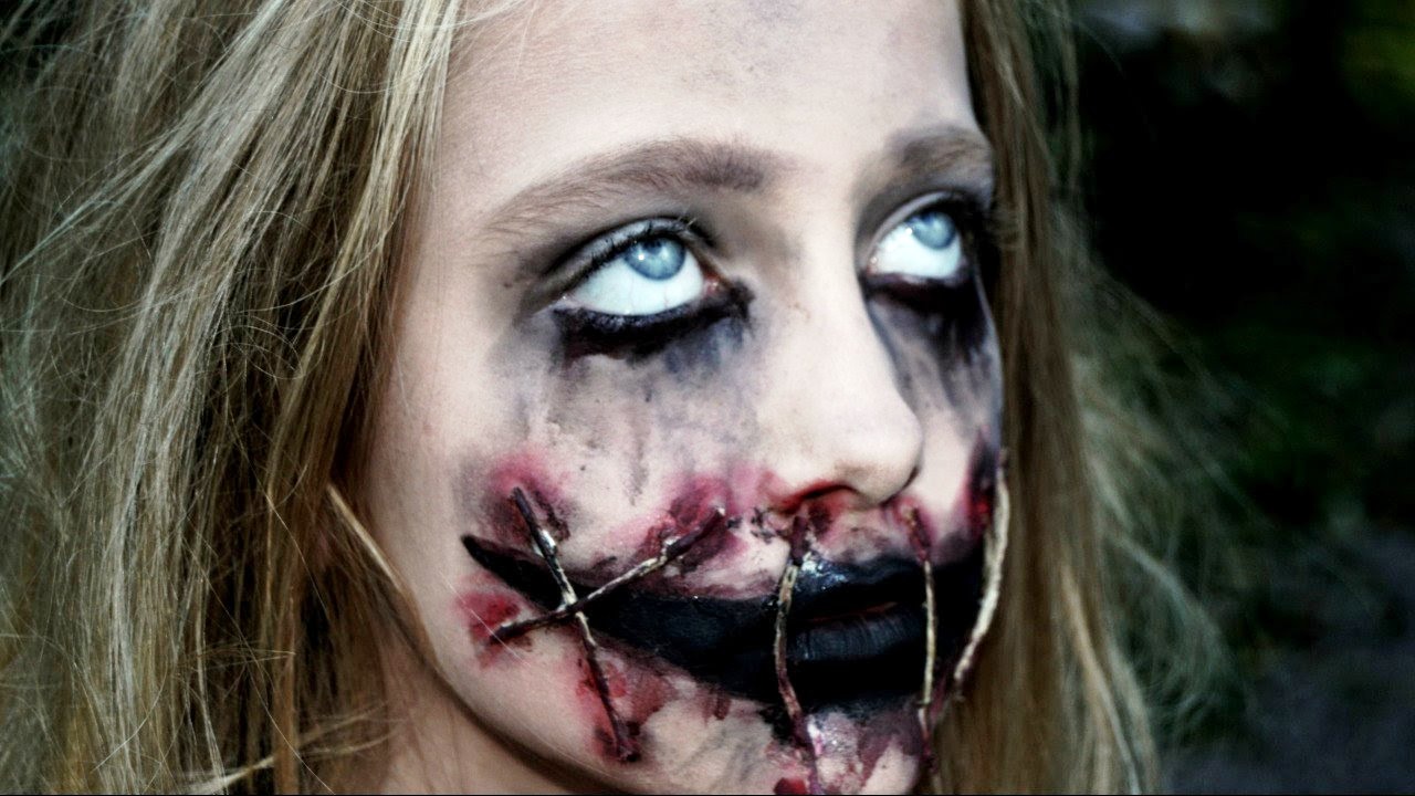 Creepy Girl With Ripped Mouth Halloween Makeup