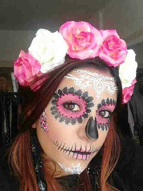 pink flowers on sugar skull makeup for halloween