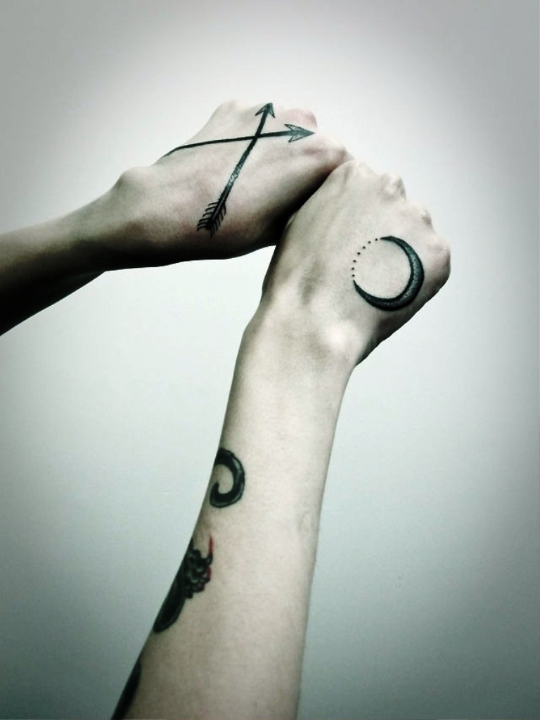 Arrow Tattoo On Hand for Women