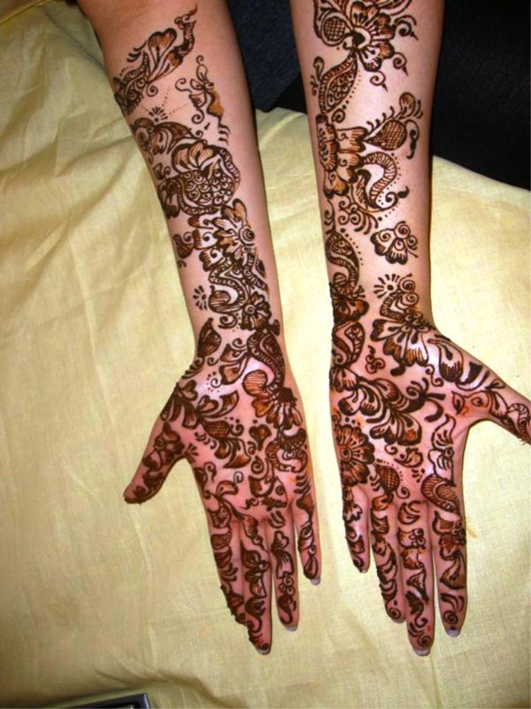 Full hand and arm Bridal Mehndi Designs .