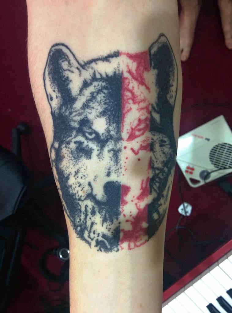 Geometric Wolf Tattoo Forearm