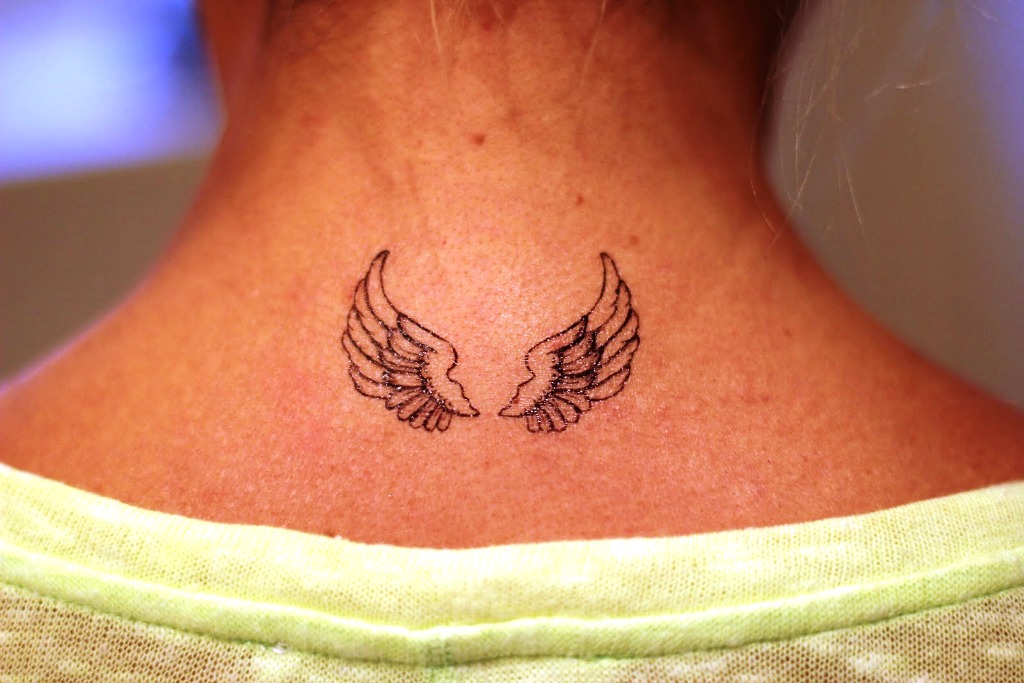 Small Angel Wings Tattoo On Neck