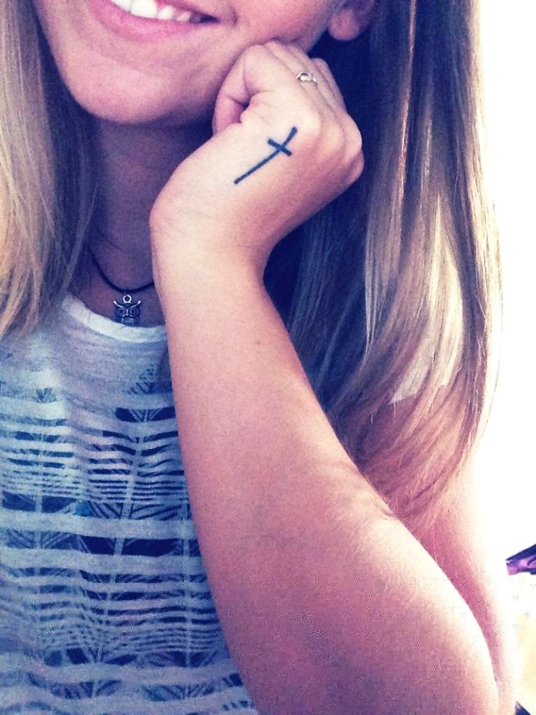 Small Cross Hand Tattoo On Side