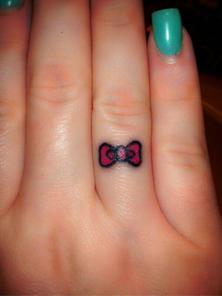 Tiny Hello Kitty Bow Tattoo