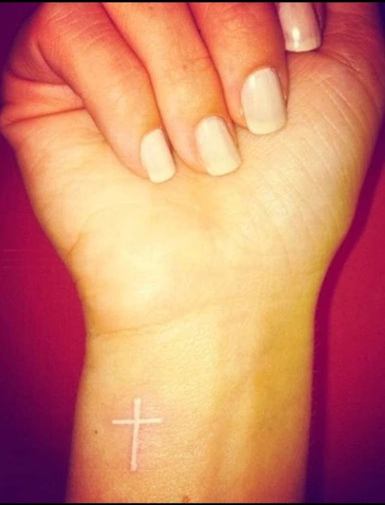 White Cross Tattoo On Wrist