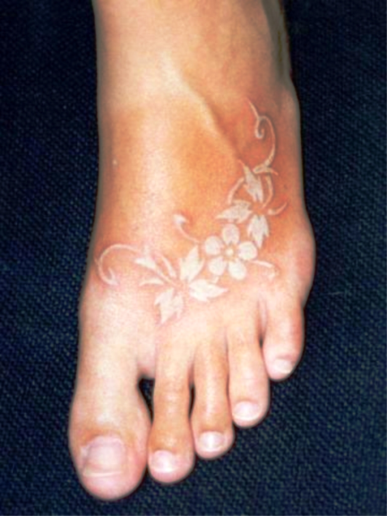 White Ink Foot Tattoo