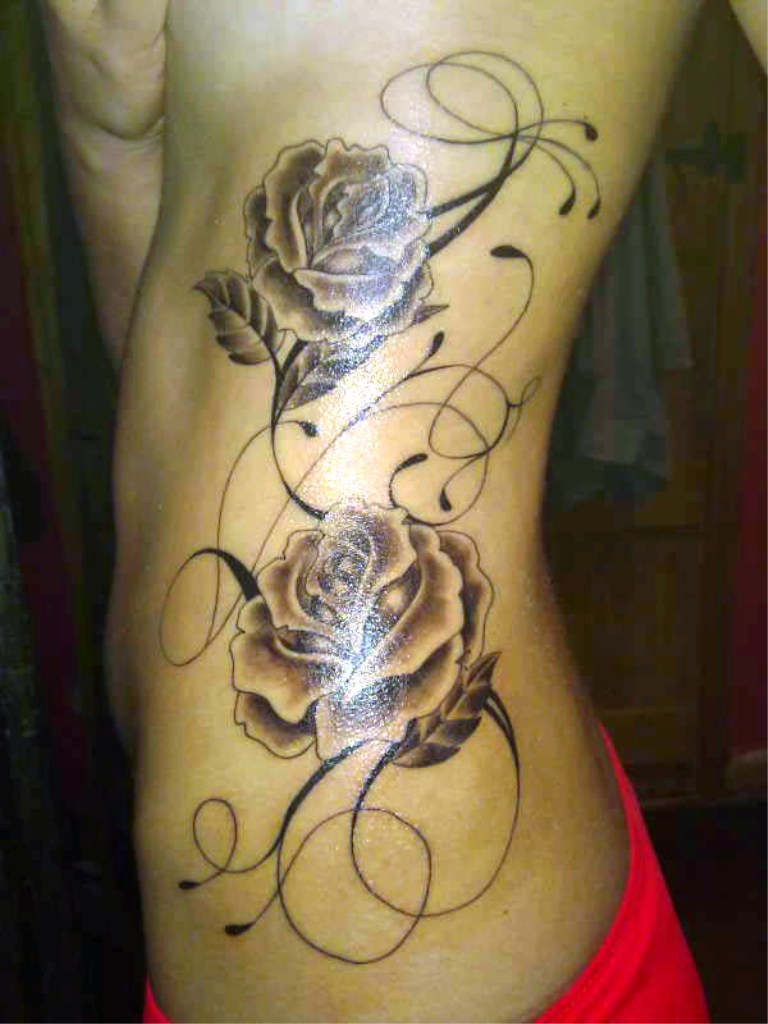 flower-tattoos-on-rib-for-girls