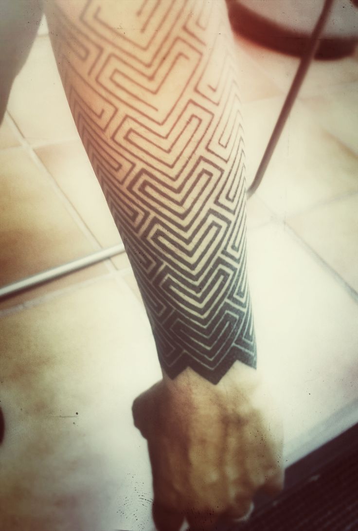 black-geometric-tattoo-arm
