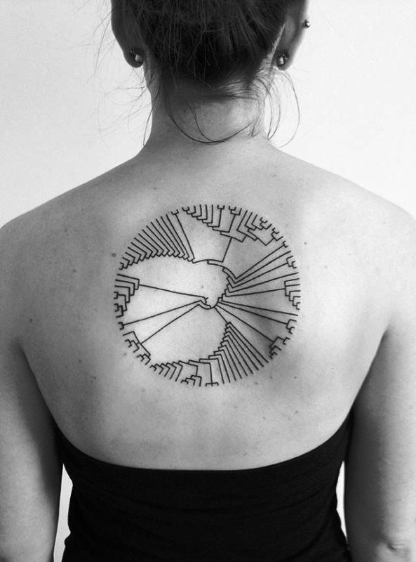 circle-s-on-back-tattoo