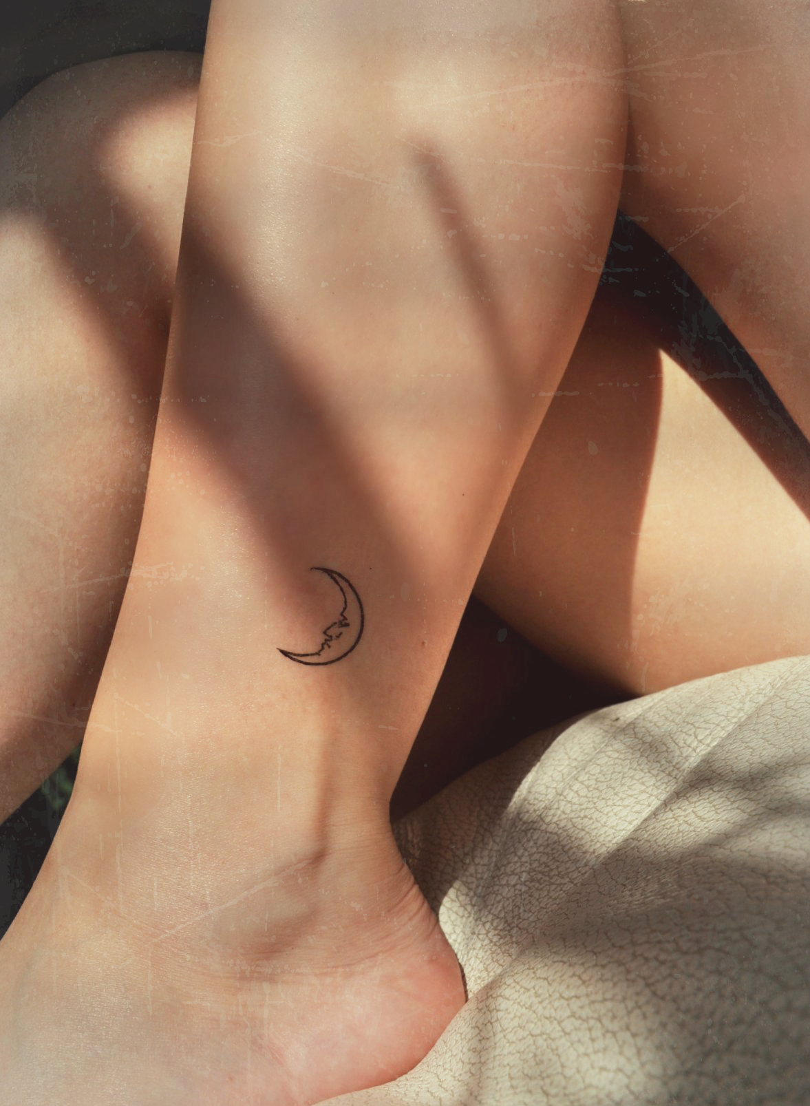 crescent-moon-ankle-tattoo