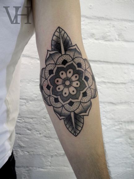 elbow-mandala-flower-tattoos