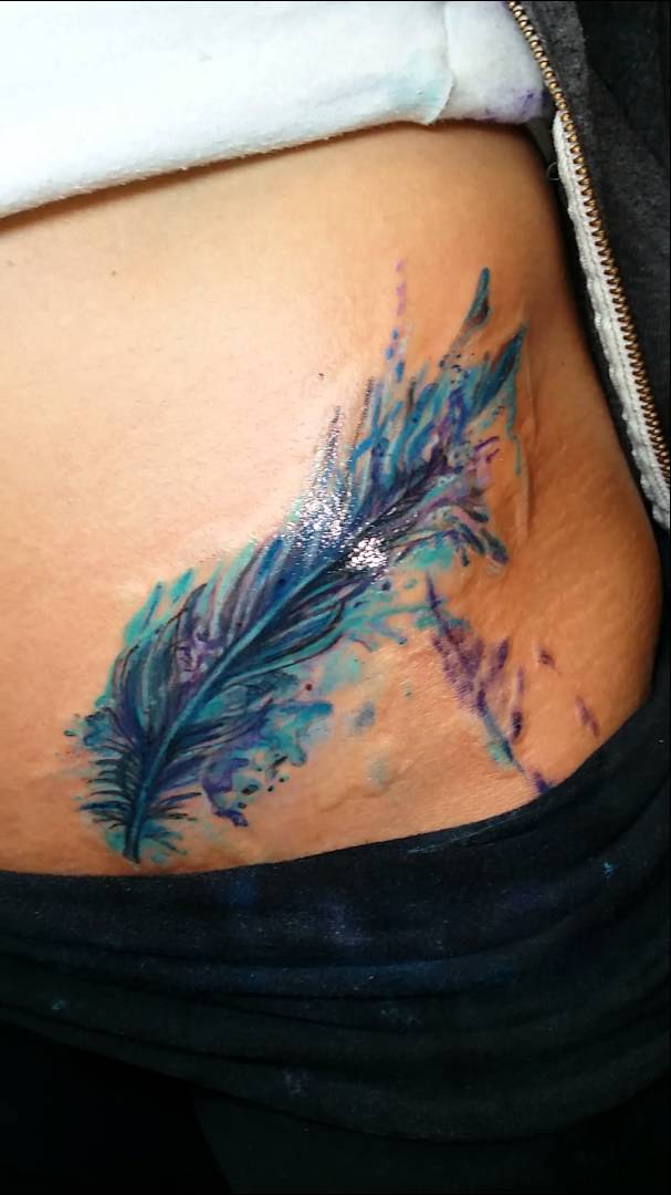 feather-tattoo-cover-up