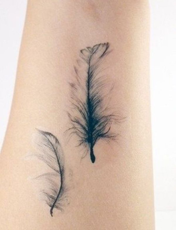 feather-tattoos-on-wrist-for-women
