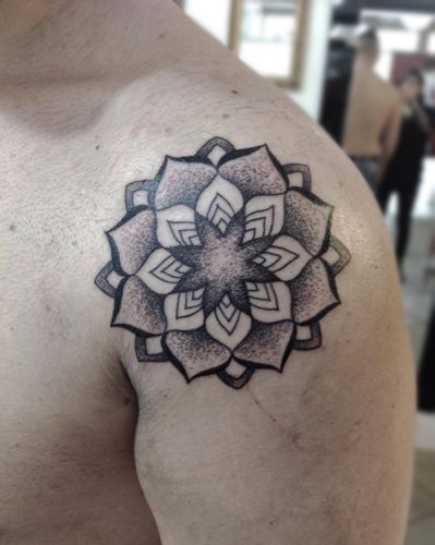 geometric-dotwork-flower-tattoo