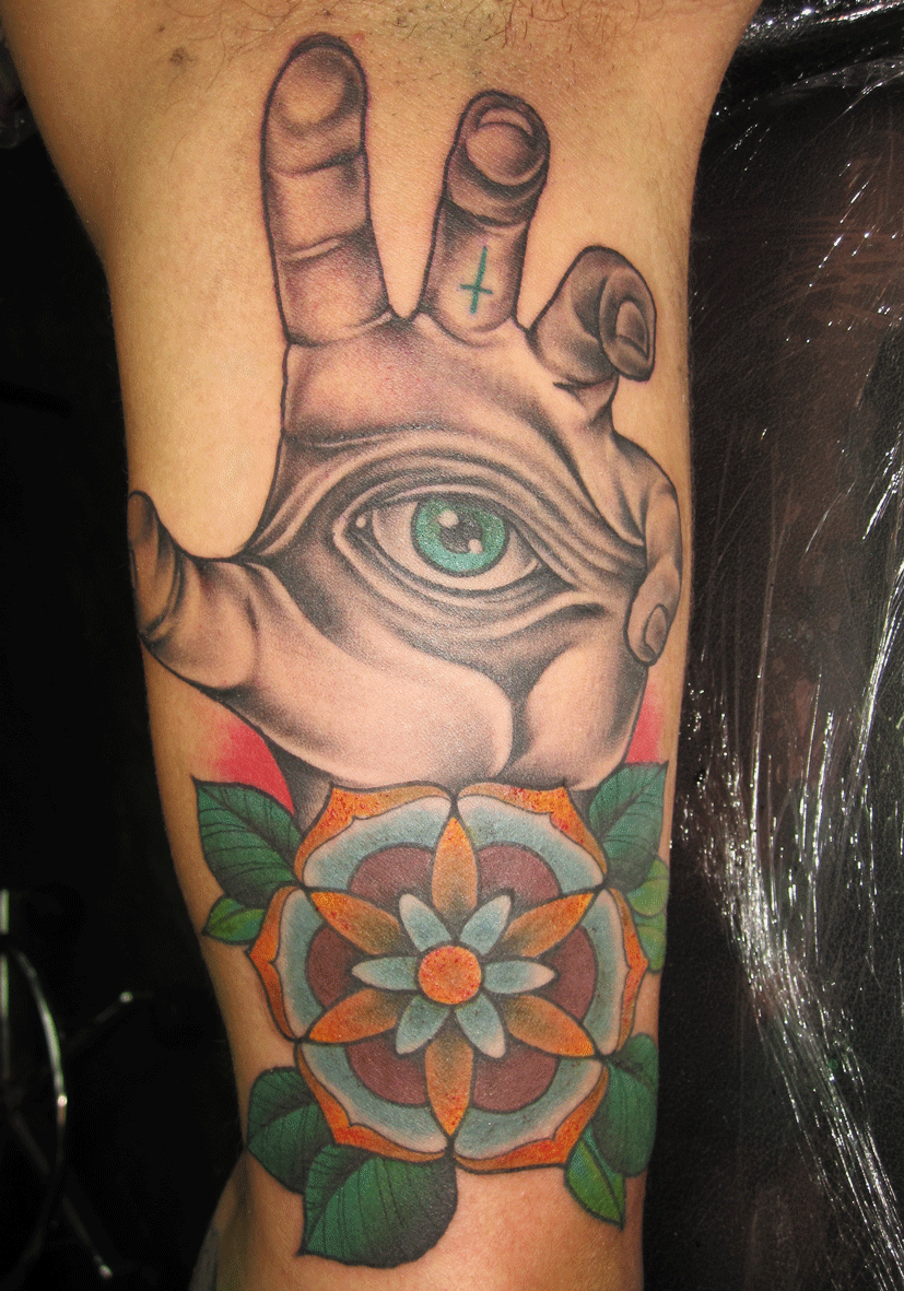 geometric-flower-tattoo-on-hand