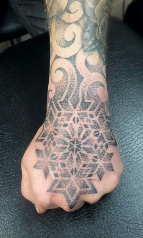 geometric-flower-tattoos