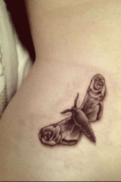 geometric-moth-tattoo-ribs