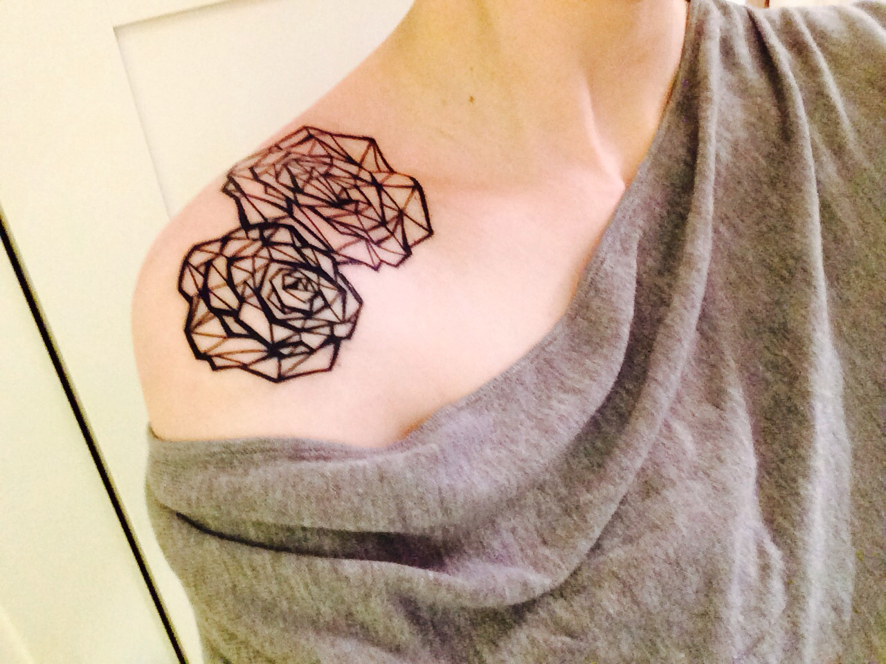 geometric-rose-tattoo