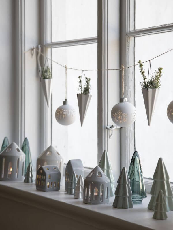 A collection of festive candle holders on the window sill (1)